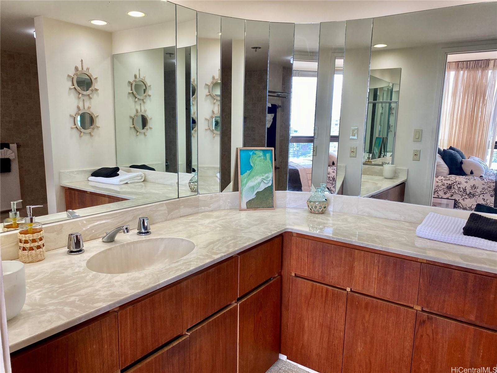 Royal Iolani 583 Kamoku Street Unit 2405 Honolulu HI 96826 listed 0511