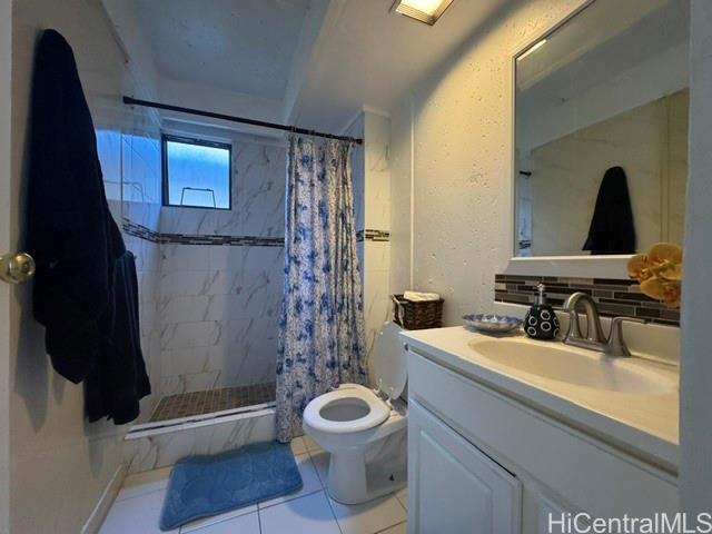 98-310 Kamehameha Highway  Unit 129